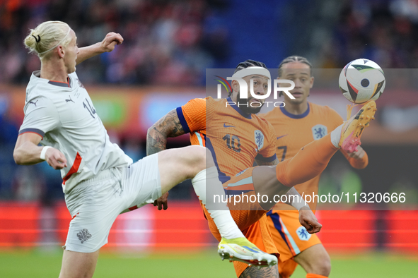 Memphis Depay Centre-Forward of Netherland and Atletico de Madrid in action during the international friendly match between Netherlands and...