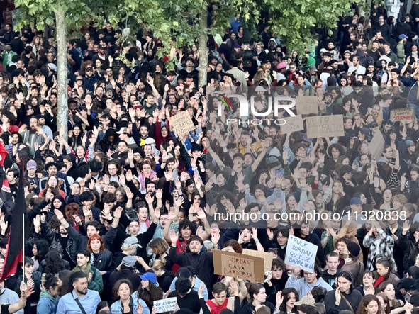 Protesters gather during a demonstration at the Place de la Republique against the victory of the French far-right party Rassemblement Natio...