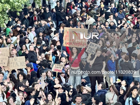 Protesters gather during a demonstration at the Place de la Republique against the victory of the French far-right party Rassemblement Natio...