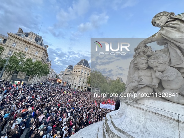 Protesters gather during a demonstration at the Place de la Republique against the victory of the French far-right party Rassemblement Natio...