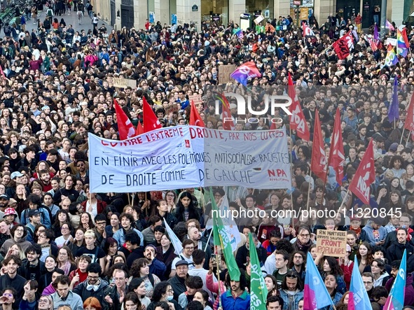 Protesters gather during a demonstration at the Place de la Republique against the victory of the French far-right party Rassemblement Natio...