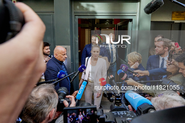 French far-right Reconquete party lead candidate Marion Marechal speaks to media representatives outside the Rassemblement National (RN) par...