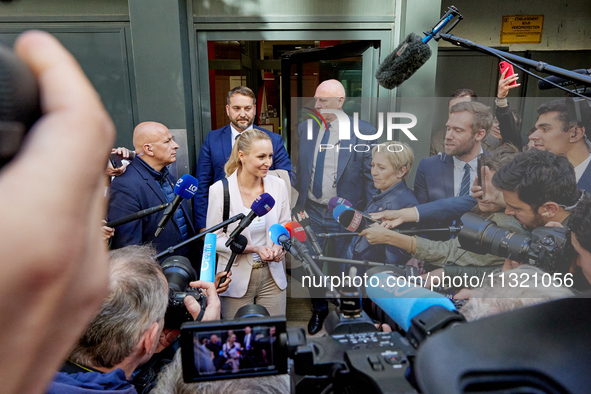 French far-right Reconquete party lead candidate Marion Marechal speaks to media representatives outside the Rassemblement National (RN) par...