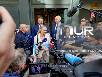 French far-right Reconquete party lead candidate Marion Marechal speaks to media representatives outside the Rassemblement National (RN) par...