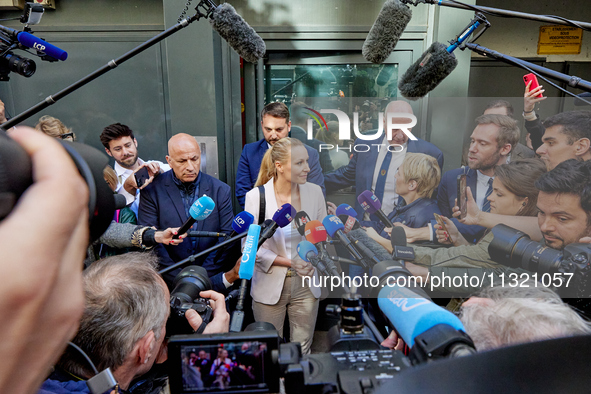 French far-right Reconquete party lead candidate Marion Marechal speaks to media representatives outside the Rassemblement National (RN) par...