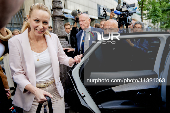 French far-right Reconquete party lead candidate Marion Marechal speaks to media representatives outside the Rassemblement National (RN) par...