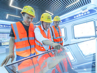 Workers are conducting safety inspections at a VR safety experience hall in Huzhou, China, on June 11, 2024. (