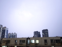 Strong winds, torrential rain, thunder, and lightning are occurring at dusk in Beijing, China, on June 11, 2024. (