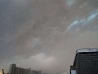 Strong winds, torrential rain, thunder, and lightning are occurring at dusk in Beijing, China, on June 11, 2024. (