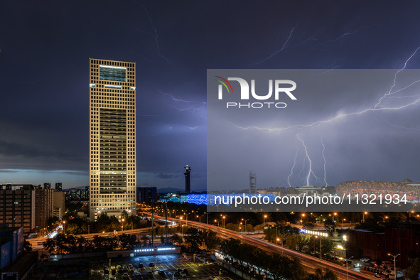 Thunderstorms and strong winds are occurring over the National Stadium in Beijing, China, on June 11, 2024. 