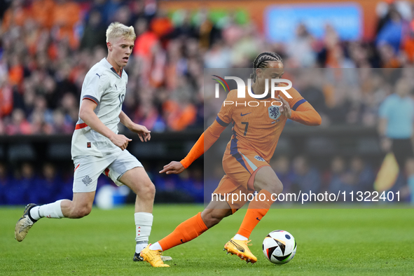 Xavi Simons Attacking Midfield of Netherland and RB Leipzig and Hakon Arnar Haraldsson Left Winger of Iceland and LOSC Lille during the inte...