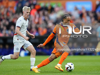 Xavi Simons Attacking Midfield of Netherland and RB Leipzig and Hakon Arnar Haraldsson Left Winger of Iceland and LOSC Lille during the inte...