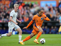 Xavi Simons Attacking Midfield of Netherland and RB Leipzig and Hakon Arnar Haraldsson Left Winger of Iceland and LOSC Lille during the inte...