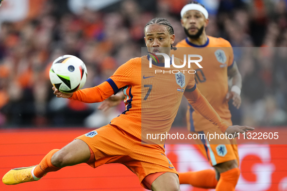 Xavi Simons Attacking Midfield of Netherland and RB Leipzig shooting to goal during the international friendly match between Netherlands and...