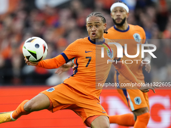 Xavi Simons Attacking Midfield of Netherland and RB Leipzig shooting to goal during the international friendly match between Netherlands and...