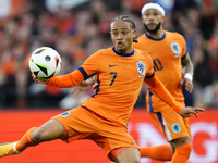 Xavi Simons Attacking Midfield of Netherland and RB Leipzig shooting to goal during the international friendly match between Netherlands and...