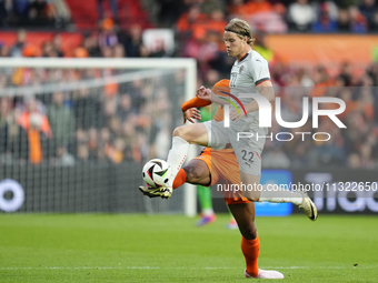 Andri Gudjohnsen Centre-Forward of Iceland and Lyngby BK and Virgil van Dijk Centre-Back of Netherland and Liverpool FC compete for the ball...