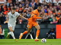 Bjarki Bjarkason Left Winger of Iceland and Venezia FC  and Cody Gakpo Left Winger of Netherland and Liverpool FC compete for the ball durin...