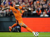 Memphis Depay Centre-Forward of Netherland and Atletico de Madrid controls the ball during the international friendly match between Netherla...