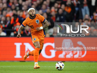 Memphis Depay Centre-Forward of Netherland and Atletico de Madrid controls the ball during the international friendly match between Netherla...