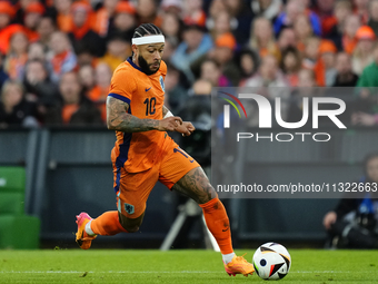 Memphis Depay Centre-Forward of Netherland and Atletico de Madrid controls the ball during the international friendly match between Netherla...