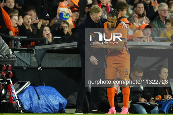 Ronald Koeman head coach of Netherland and Nathan Ake Centre-Back of Netherland and Manchester City during the international friendly match...