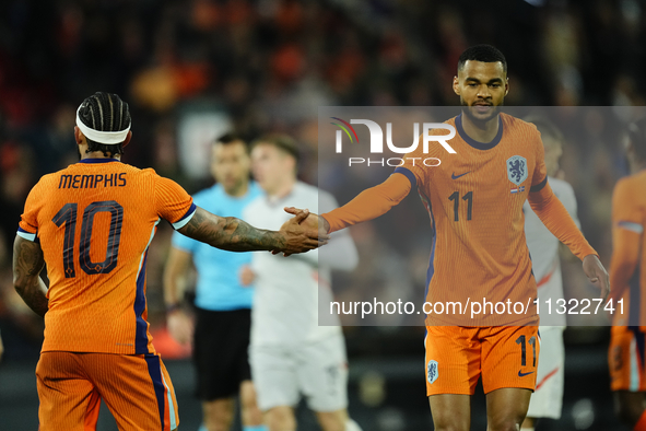 Memphis Depay Centre-Forward of Netherland and Atletico de Madrid and Cody Gakpo Left Winger of Netherland and Liverpool FC during the inter...