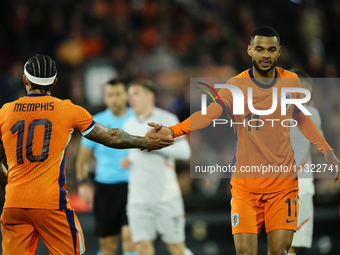 Memphis Depay Centre-Forward of Netherland and Atletico de Madrid and Cody Gakpo Left Winger of Netherland and Liverpool FC during the inter...