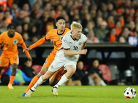 Hakon Arnar Haraldsson Left Winger of Iceland and LOSC Lille and  Tijjani Reijnders Central Midfield of Netherland and AC Milan compete for...