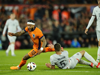 Memphis Depay Centre-Forward of Netherland and Atletico de Madrid and Bjarki Bjarkason Left Winger of Iceland and Venezia FC compete for the...