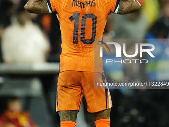 Memphis Depay Centre-Forward of Netherland and Atletico de Madrid celebrates after scoring his sides first goal during the international fri...