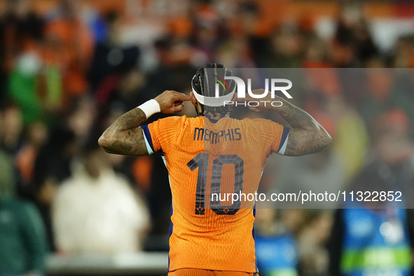 Memphis Depay Centre-Forward of Netherland and Atletico de Madrid celebrates after scoring his sides first goal during the international fri...