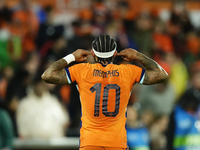 Memphis Depay Centre-Forward of Netherland and Atletico de Madrid celebrates after scoring his sides first goal during the international fri...