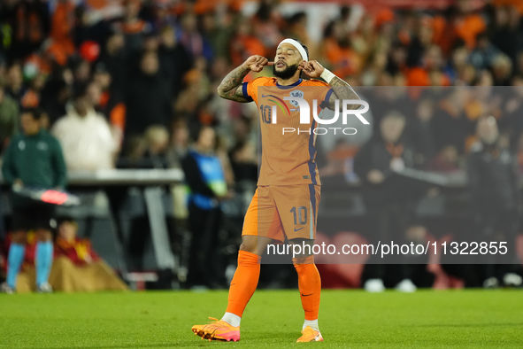 Memphis Depay Centre-Forward of Netherland and Atletico de Madrid celebrates after scoring his sides first goal during the international fri...