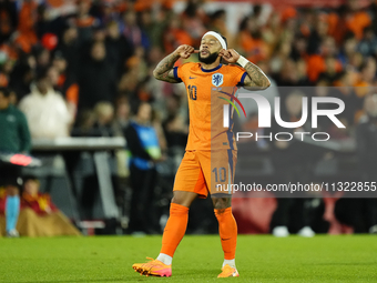 Memphis Depay Centre-Forward of Netherland and Atletico de Madrid celebrates after scoring his sides first goal during the international fri...