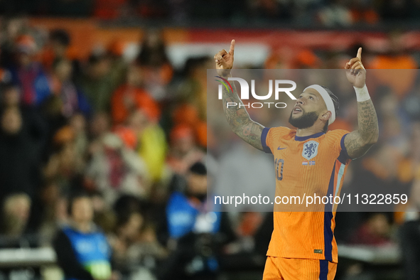 Memphis Depay Centre-Forward of Netherland and Atletico de Madrid celebrates after scoring his sides first goal during the international fri...