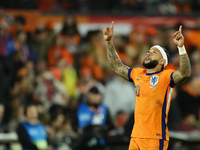 Memphis Depay Centre-Forward of Netherland and Atletico de Madrid celebrates after scoring his sides first goal during the international fri...