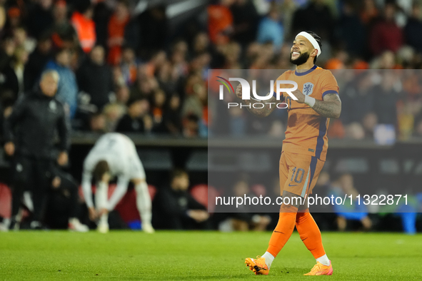 Memphis Depay Centre-Forward of Netherland and Atletico de Madrid celebrates after scoring his sides first goal during the international fri...