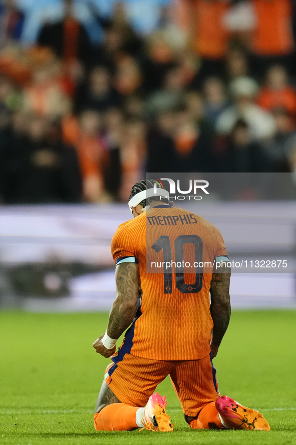 Memphis Depay Centre-Forward of Netherland and Atletico de Madrid celebrates after scoring his sides first goal during the international fri...