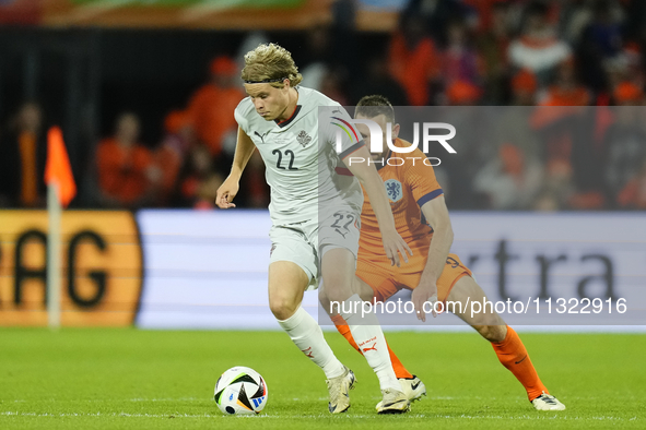 Andri Gudjohnsen Centre-Forward of Iceland and Lyngby BK  and Stefan de Vrij Centre-Back of Netherland and Inter Milan compete for the ball...