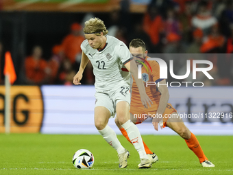 Andri Gudjohnsen Centre-Forward of Iceland and Lyngby BK  and Stefan de Vrij Centre-Back of Netherland and Inter Milan compete for the ball...