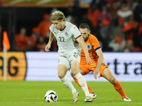 Andri Gudjohnsen Centre-Forward of Iceland and Lyngby BK  and Stefan de Vrij Centre-Back of Netherland and Inter Milan compete for the ball...