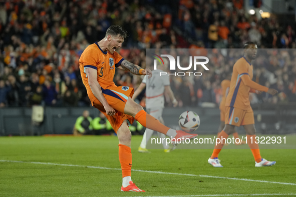 Wout Weghorst Centre-Forward of Netherland and TSG 1899 Hoffenheim celebrates after scoring his sides first goal during the international fr...