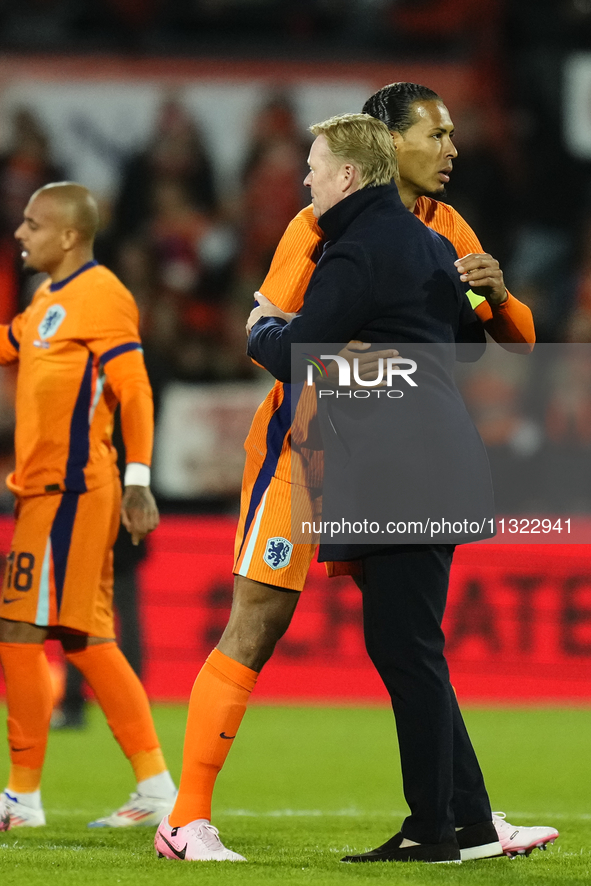 Ronald Koeman head coach of Netherland and Virgil van Dijk Centre-Back of Netherland and Liverpool FC celebrates victory after the internati...