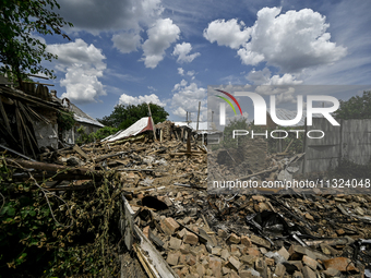 The rubble is covering the ground at a house that is partially destroyed by a Russian drone attack in Orikhiv, Zaporizhzhia region, southeas...