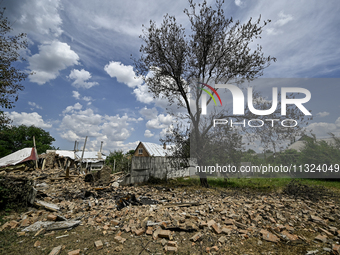 The rubble is covering the ground near a house that is partially destroyed by a Russian drone attack in Orikhiv, Zaporizhzhia region, southe...