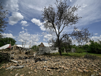 The rubble is covering the ground near a house that is partially destroyed by a Russian drone attack in Orikhiv, Zaporizhzhia region, southe...