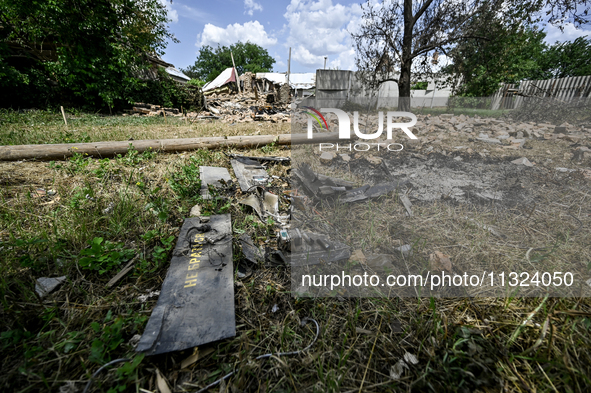 Debris is covering the ground at a house that is partially destroyed by a Russian drone attack in Orikhiv, Zaporizhzhia region, southeastern...