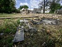 Debris is covering the ground at a house that is partially destroyed by a Russian drone attack in Orikhiv, Zaporizhzhia region, southeastern...