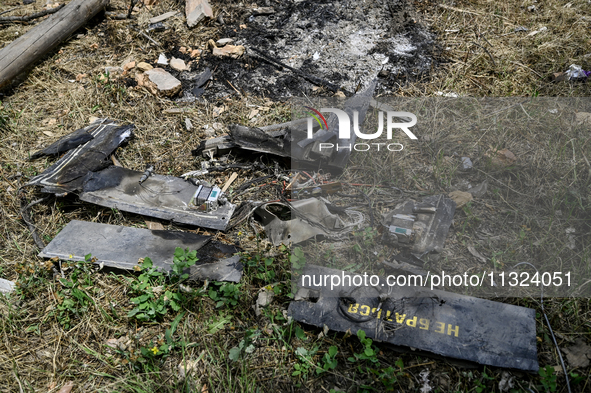 Debris is covering the ground at a house that is partially destroyed by a Russian drone attack in Orikhiv, Zaporizhzhia region, southeastern...